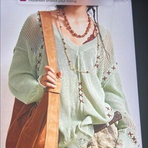 018 Women's Green Sweater with Cross Stitch Detail